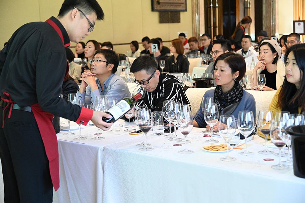 Staff pouring Château Léoville Las Cases at the masterclass